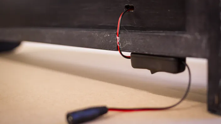 A LED light switch is attached to the bottom of the lightbox.