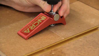 An INCRA brand hold down.