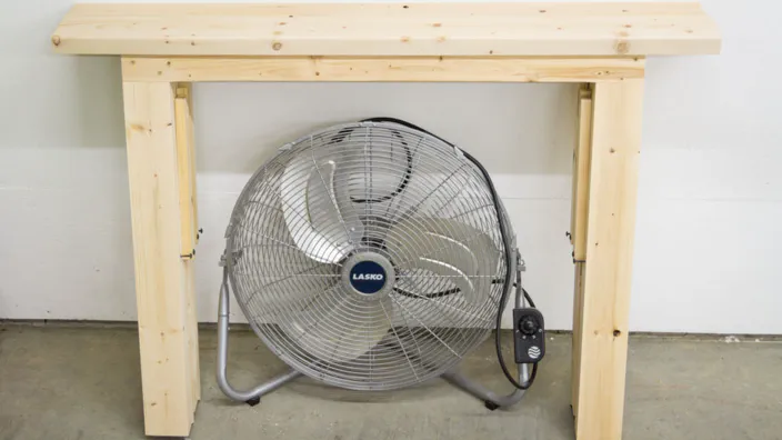 A pair of sawhorses folded up.