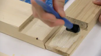 Glue is applied to a lap joint.