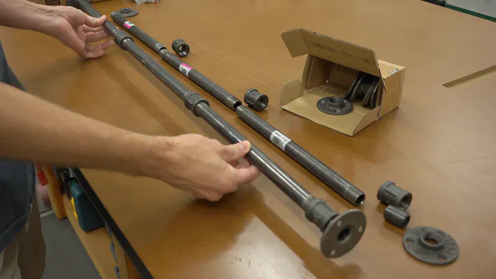 Steel pipe and connections for shelving.