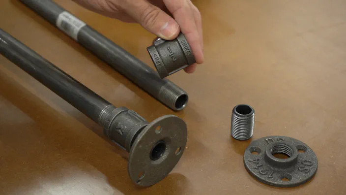 Steel pipe and connections for shelving.