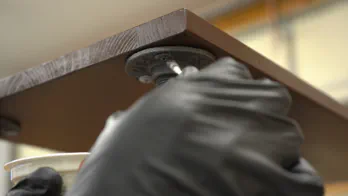 Paint is applied to the screw heads.