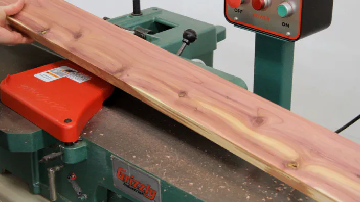 A piece of cedar with one face and one edge joined.