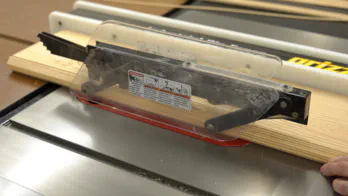 Ripping the guide rail at the table saw.