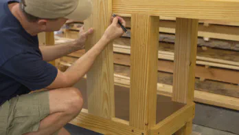 Ripping the guide rail at the table saw.