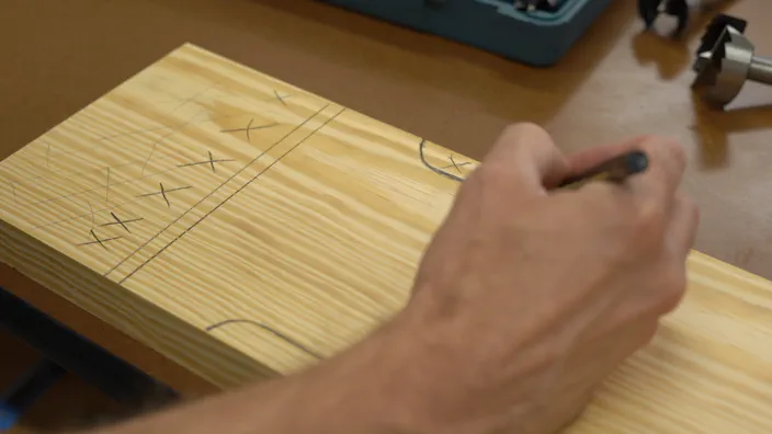 A miter saw trims the guide rail.