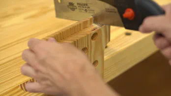 Ripping the guide rail at the table saw.