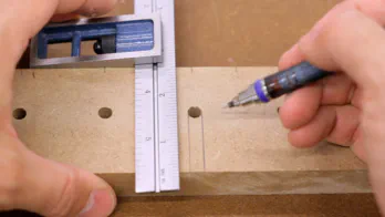 A square is used to mark slot locations.