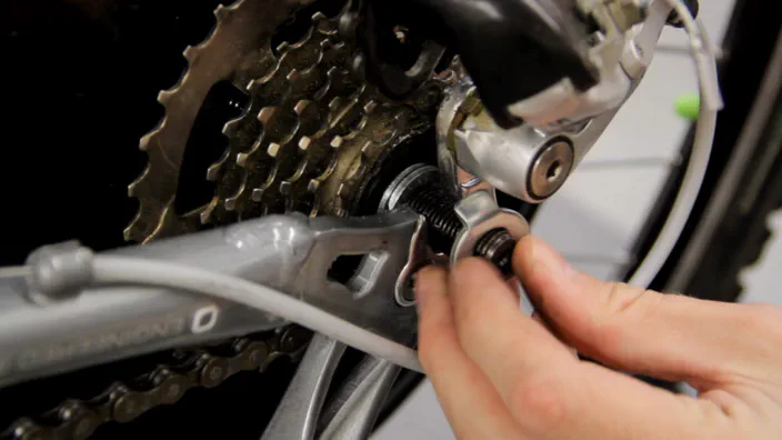 A lock washer installed on an electric bicycle wheel.