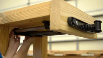 The rear vise plate is reattached.