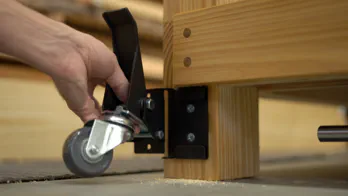 A board is clamped in the vise.